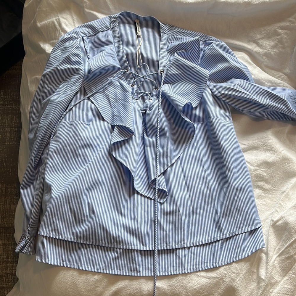 Striped shirt with ruffles